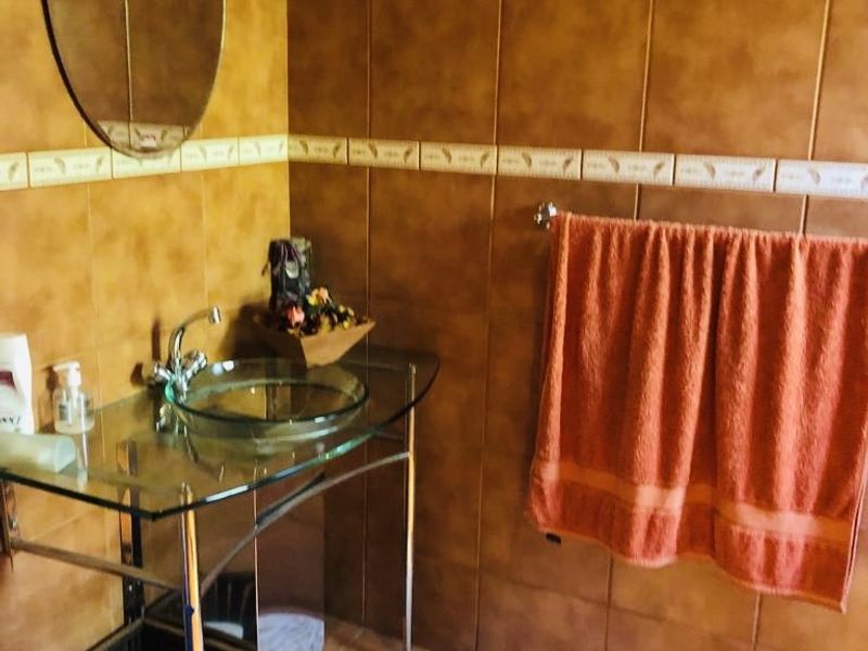 The property is well maintained and offers 4 beds, 3 baths - Photo 6