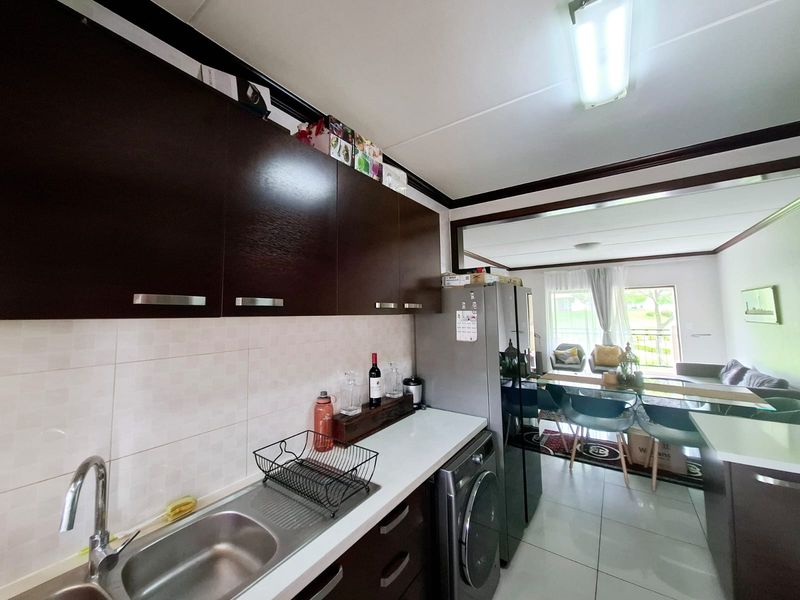Secure Warm and Spacious – Ideal Starter Home - Photo 6