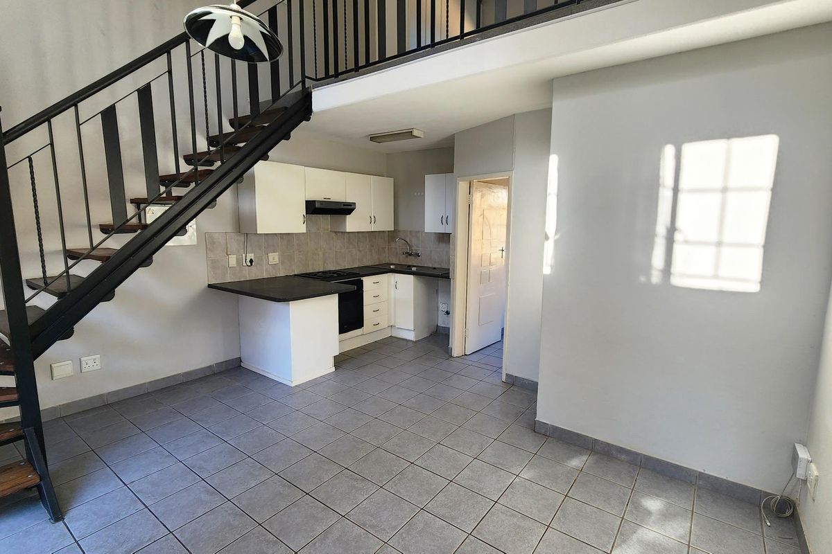 Discover peaceful living in this charming 1-bedroom loft duplex. - Photo 4