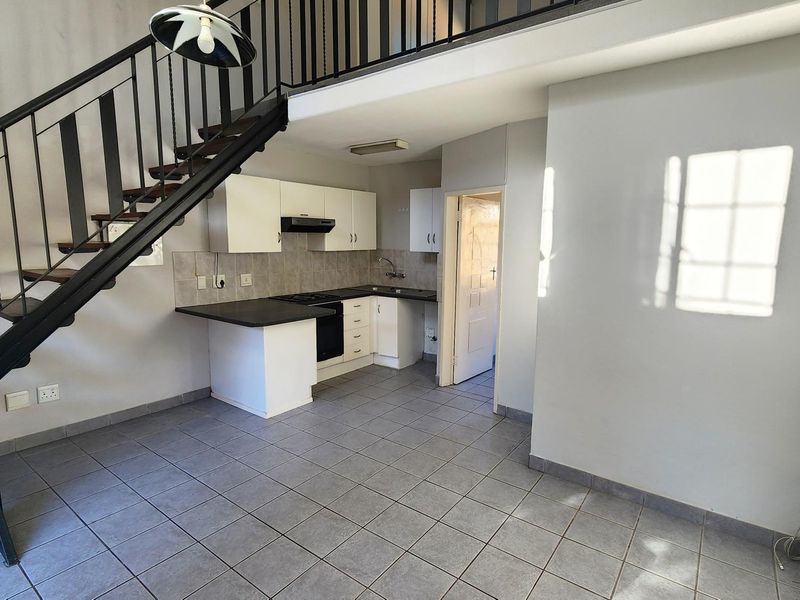 Discover peaceful living in this charming 1-bedroom loft duplex. - Photo 4