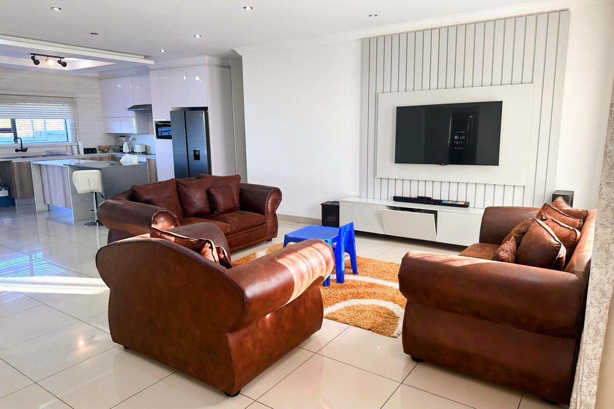 Modern 3-Bedroom Home in The Orchards - Estate Living - Photo 3