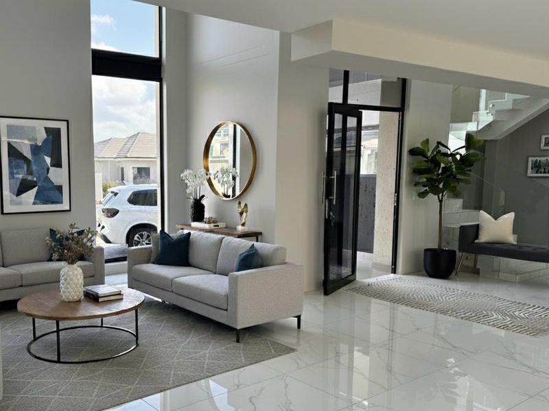 A Masterpiece of Modern Living: Exquisite 4-Bedroom Home in Prestigious Swallow Hills Estate - Photo 3