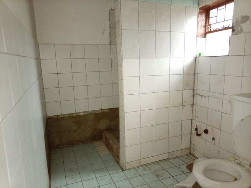 DEVELOPERS & INVESTORS. A GREAT PROJECT FIXER-UPPER WITH HUGE POTENTIAL - Photo 7