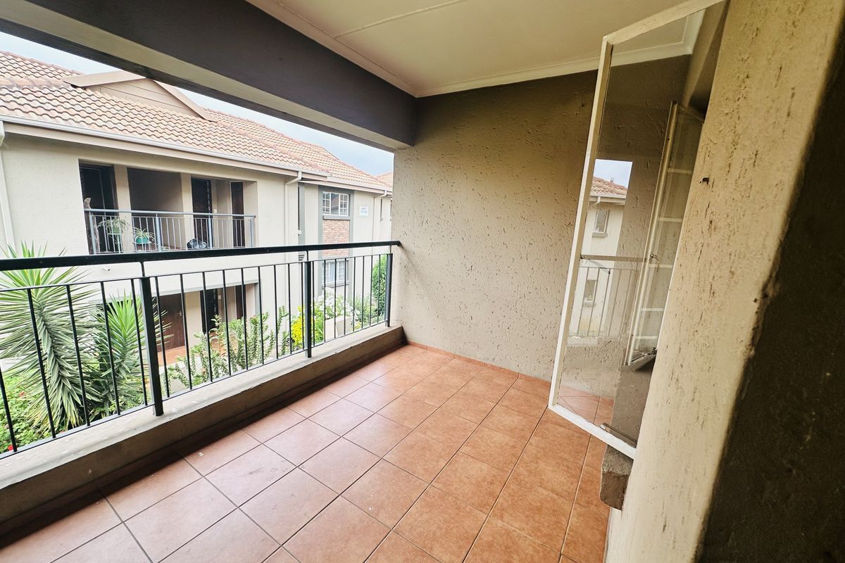 Renovated, spacious 1st Floor 2 Bedroom Unit | Large Balcony | Borehole | Secure Investment - Photo 4