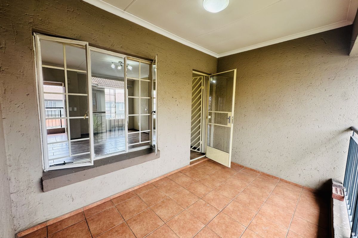Renovated, spacious 1st Floor 2 Bedroom Unit | Large Balcony | Borehole | Secure Investment - Photo 5