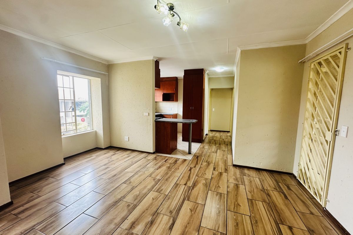 Renovated, spacious 1st Floor 2 Bedroom Unit | Large Balcony | Borehole | Secure Investment - Photo 3