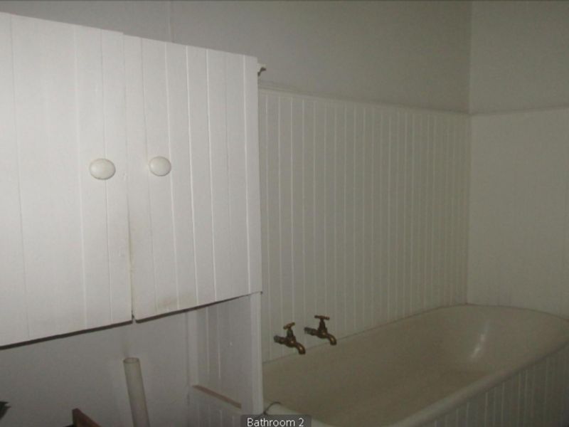 **Property Overview: Charming Family Home in the Heart of Melville** - Photo 6