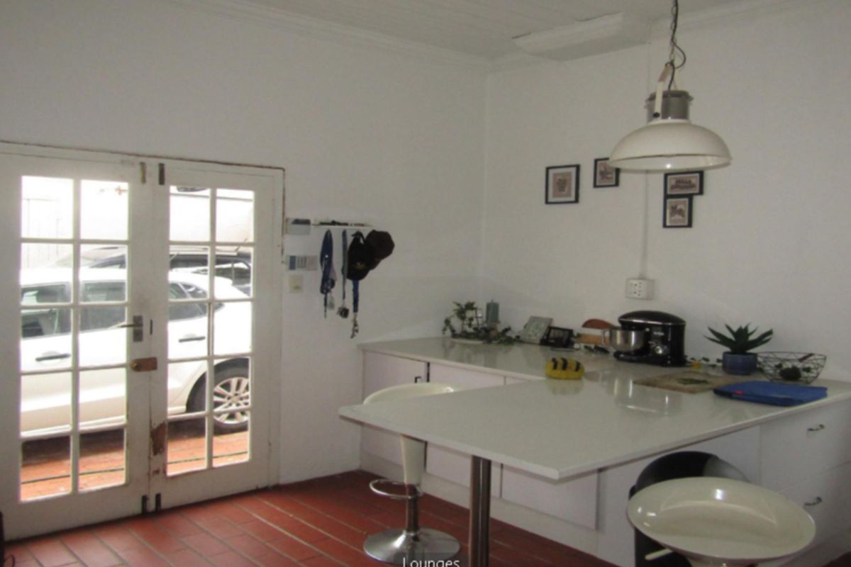 **Property Overview: Charming Family Home in the Heart of Melville** - Photo 3