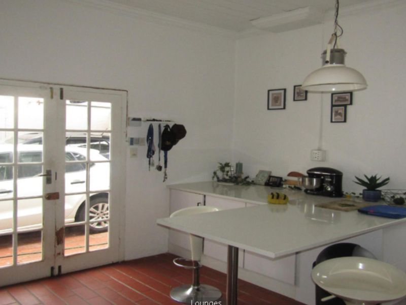 **Property Overview: Charming Family Home in the Heart of Melville** - Photo 3