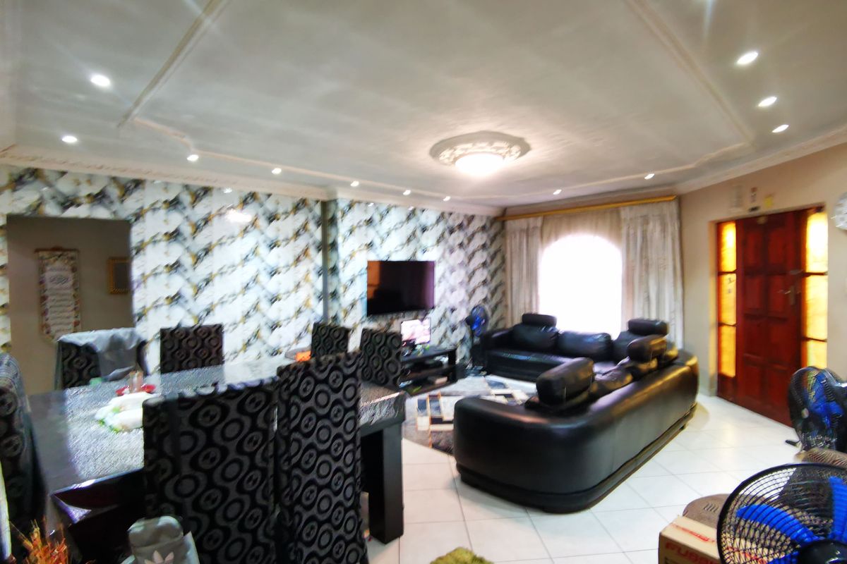 Modern Comfort Meets Suburban Serenity: Your Forever Home in Lenasia Ext 11 - Photo 4