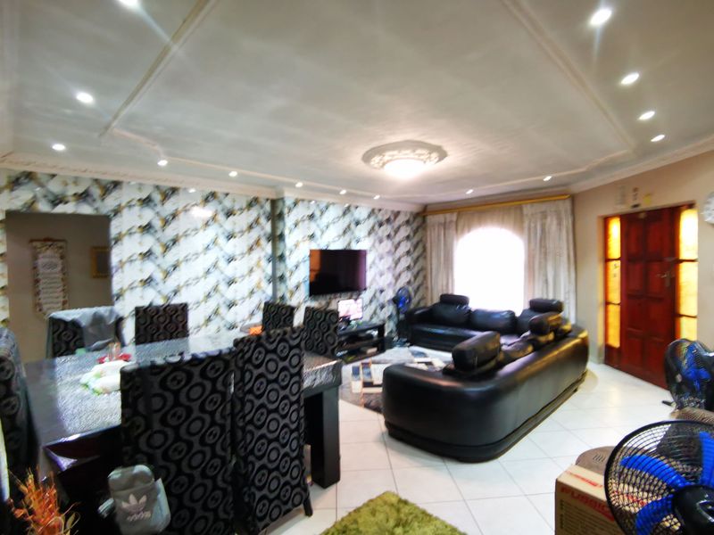 Modern Comfort Meets Suburban Serenity: Your Forever Home in Lenasia Ext 11 - Photo 4