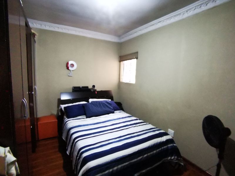 Modern Comfort Meets Suburban Serenity: Your Forever Home in Lenasia Ext 11 - Photo 9