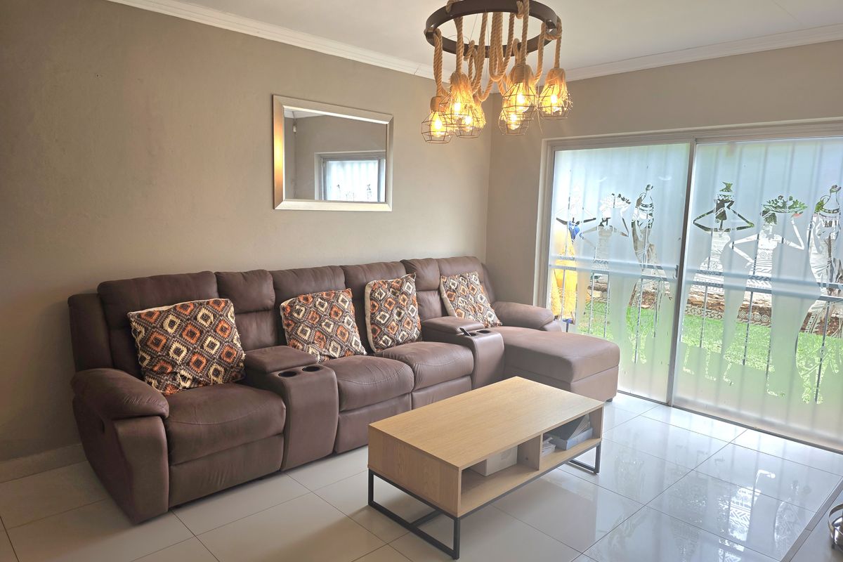 Modern living in a secure, family-friendly area! - Photo 4