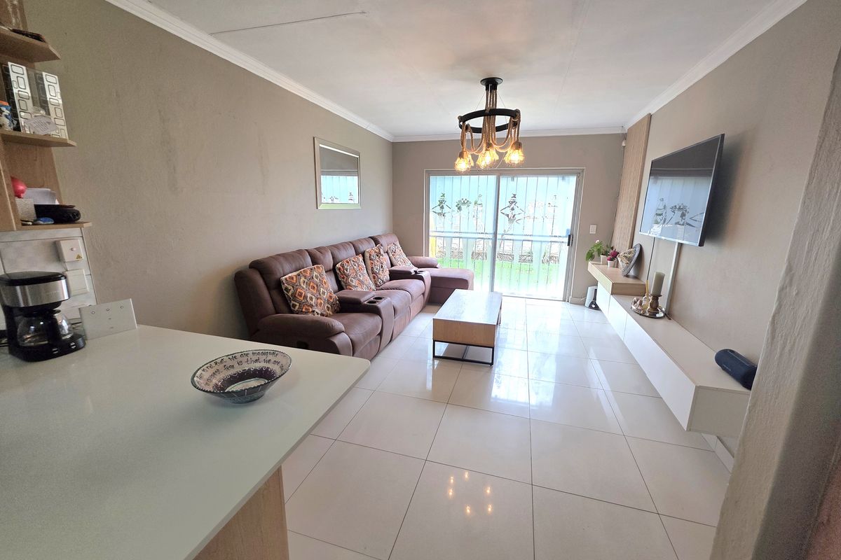 Modern living in a secure, family-friendly area! - Photo 3