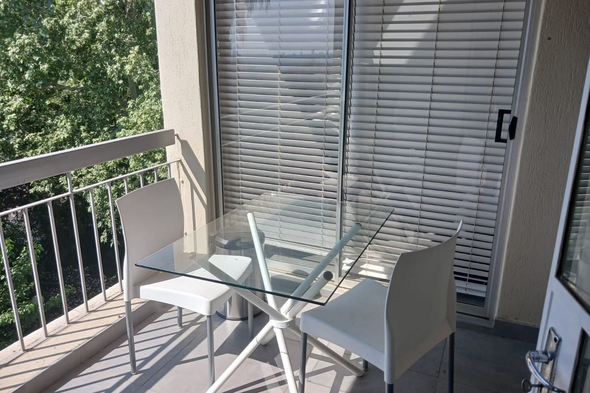 Stylish 2-bedroom furnished apartment to let in Sandhurst, Sandton—perfect for modern urban living! - Photo 2