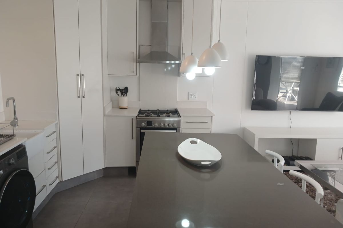Stylish 2-bedroom furnished apartment to let in Sandhurst, Sandton—perfect for modern urban living! - Photo 4