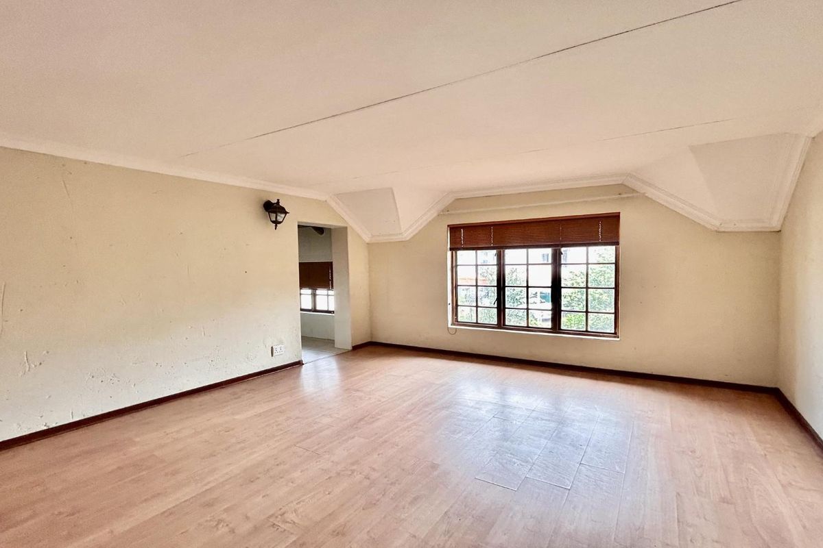 Sprawling Family Sanctuary with Pool in Prestigious Thatchaven Way - Photo 4