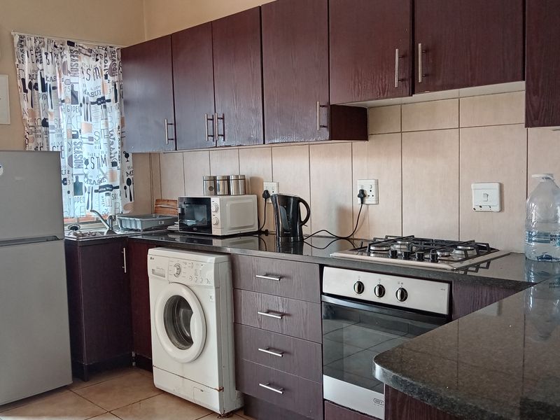 Beautiful 2 Bedroom Townhouse where Modern Comfort Meets Investment Opportunity - Photo 4