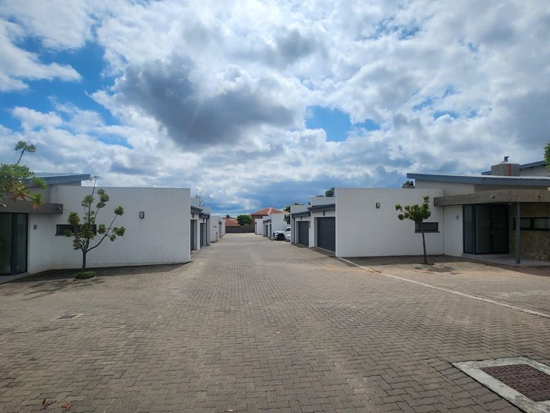 Secure, Stylish Duplex Living in the Heart of Convenience - Photo 2