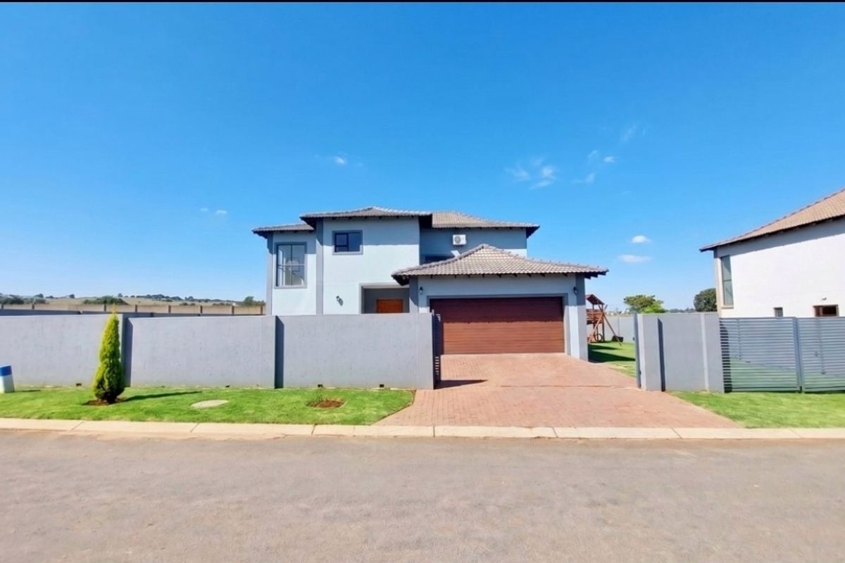 Stylish Freehold Family Home in a Secure Estate with Private Pool & Entertainment Living - Photo 3