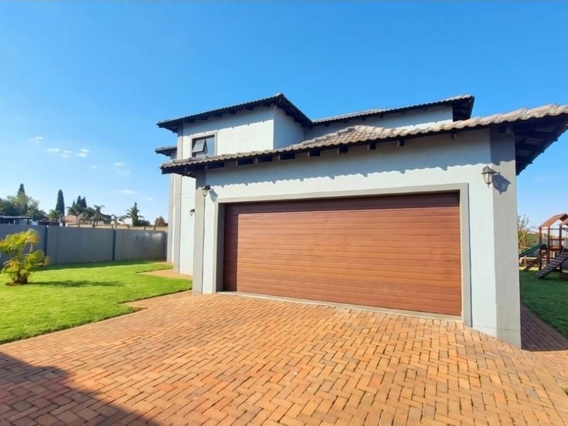 Stylish Freehold Family Home in a Secure Estate with Private Pool & Entertainment Living - Photo 2