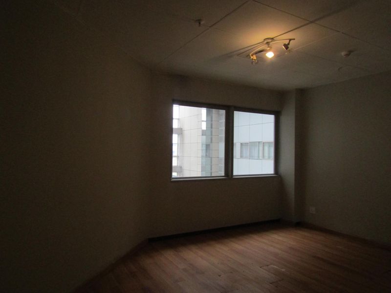 0.5 bedroom apartment for sale in vibrant Johannesburg Central - ideal for urban living! - Photo 10