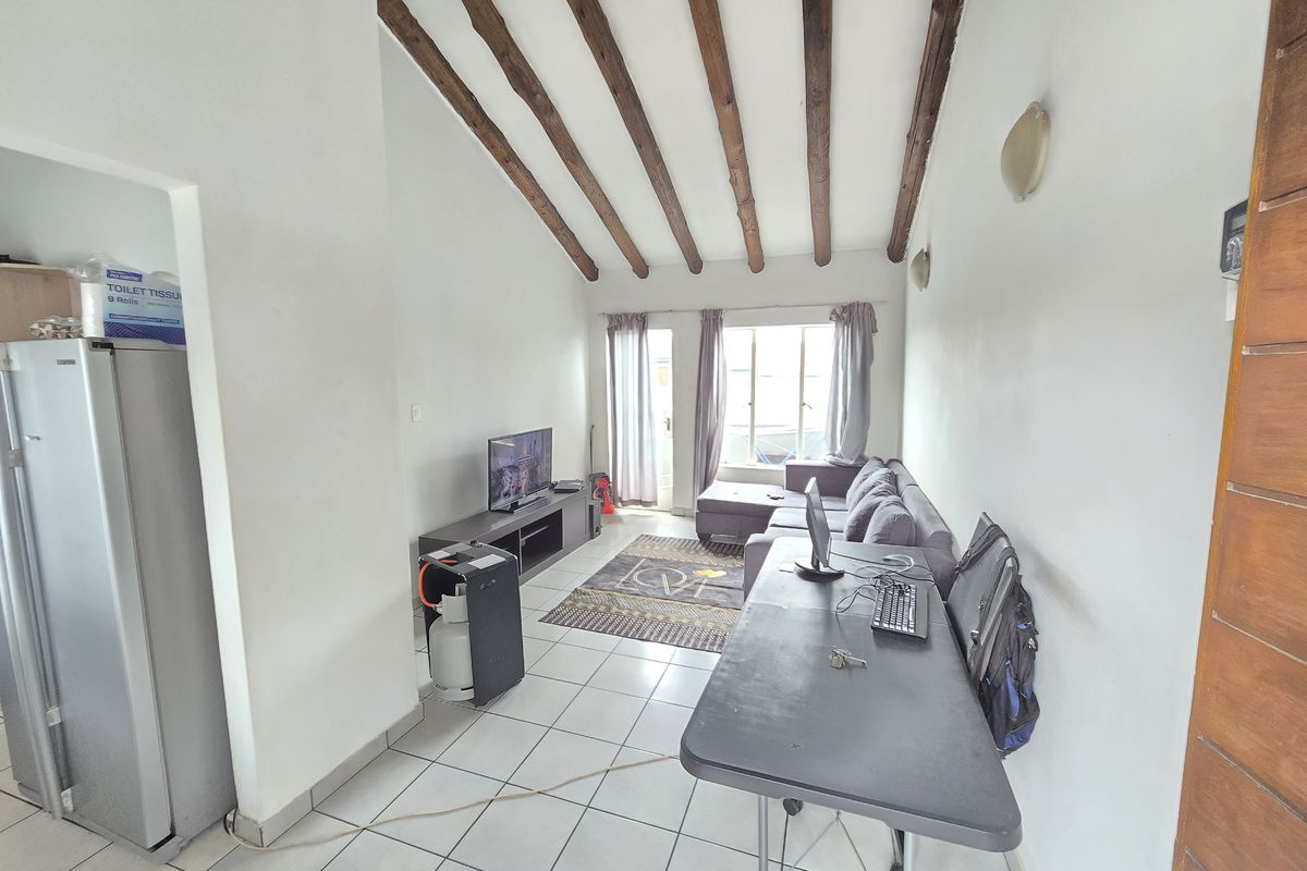 EXQUIZITE SPACE WITH HIGH CEILINGS AND LOADS OF SPACE - Photo 3