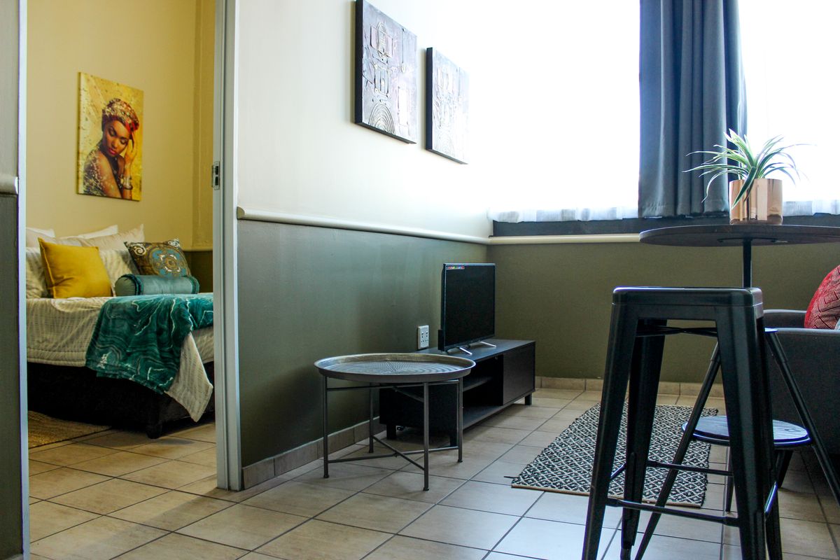The building offers rooms, bachelor apartments, and one‐bedroom layouts - Photo 4