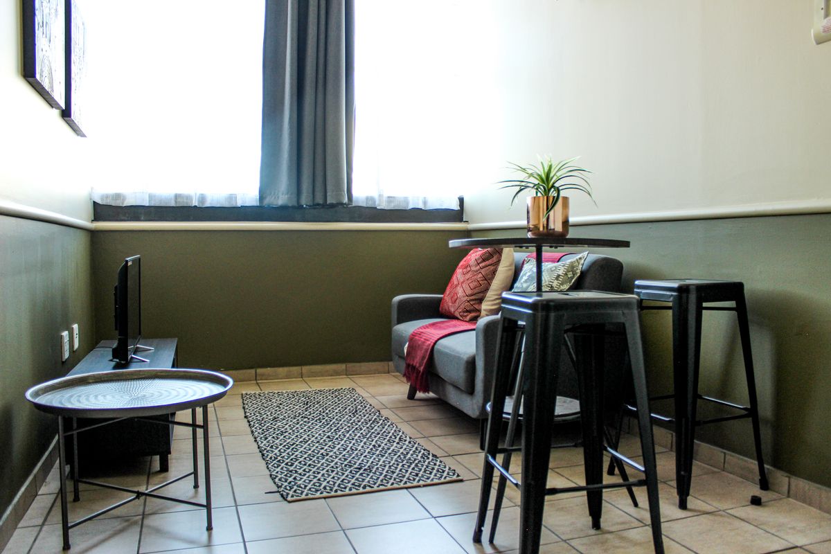 The building offers rooms, bachelor apartments, and one‐bedroom layouts - Photo 2