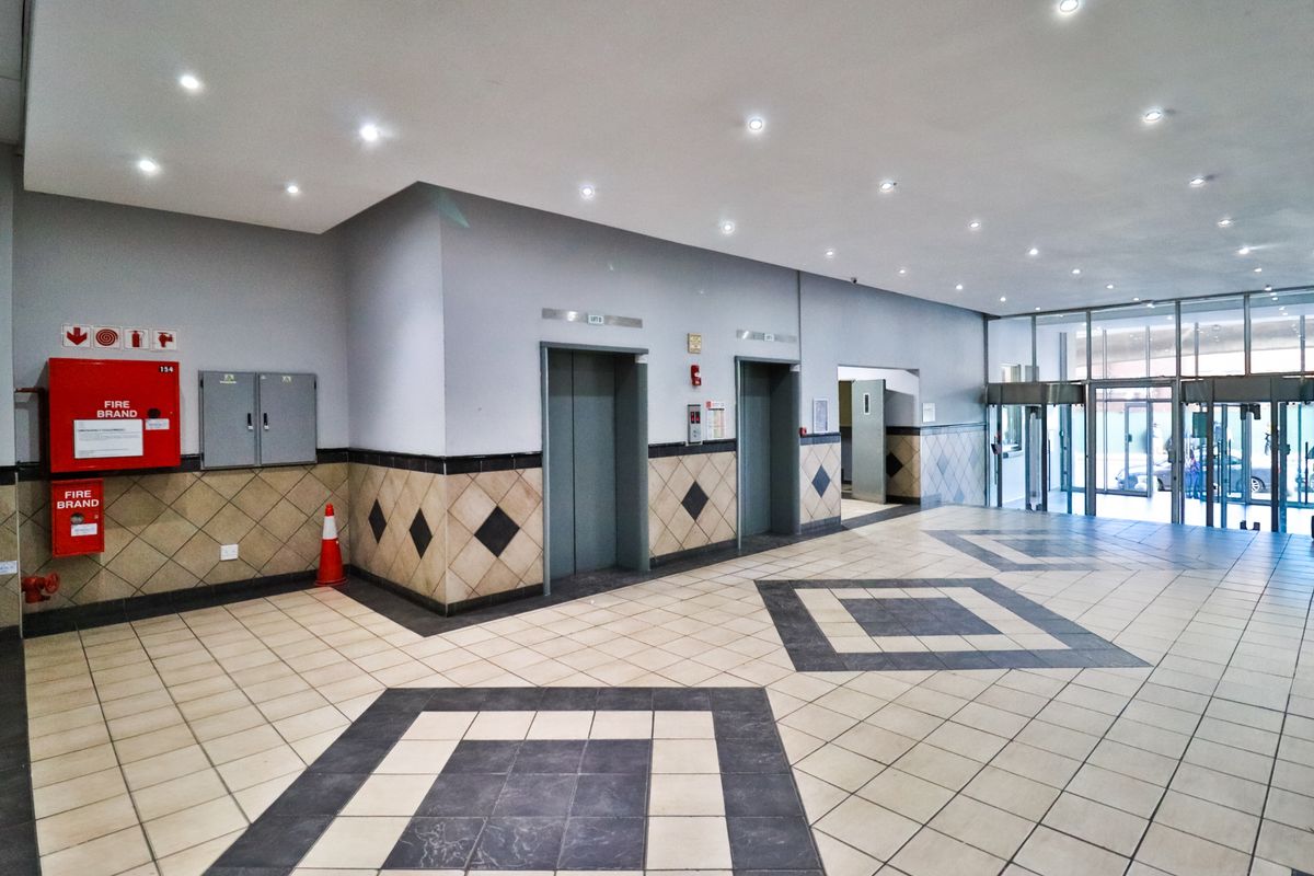 The building offers rooms, bachelor apartments, and one‐bedroom layouts - Photo 3
