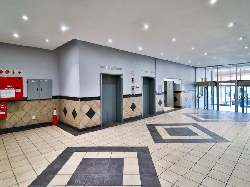 The building offers rooms, bachelor apartments, and one‐bedroom layouts - Photo 3