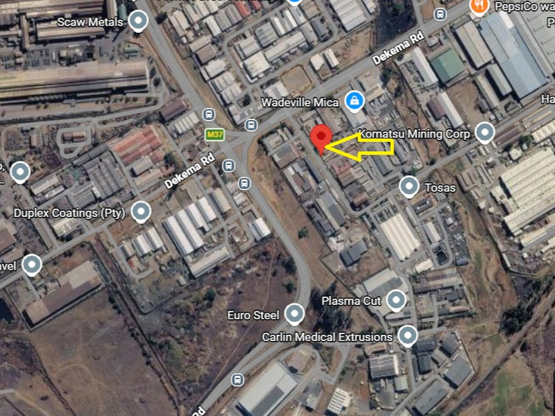 An aerial satellite view of the industrial area in Wadeville, highlighting the property location relative to surrounding industrial facilities and major roads.
