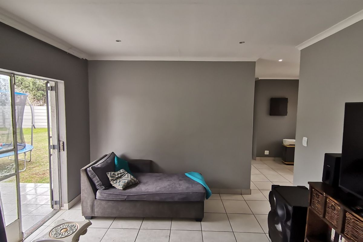 Welcome to this Exquisite Three Bedroom House with Swimming pool  and Carport nestled in the heart - Photo 3