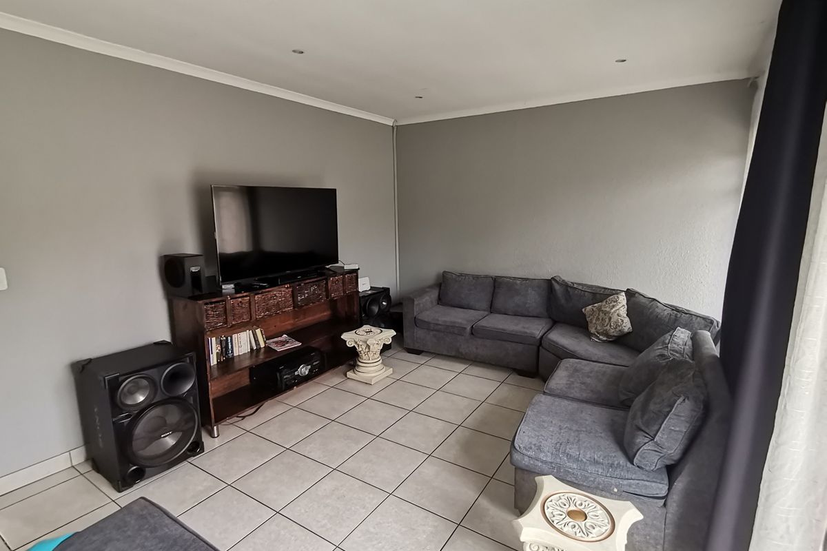 Welcome to this Exquisite Three Bedroom House with Swimming pool  and Carport nestled in the heart - Photo 4