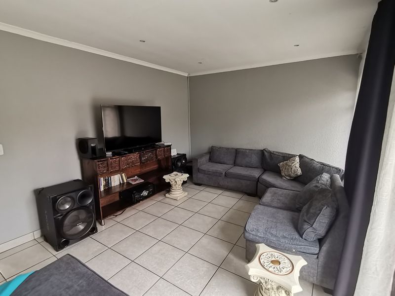 Welcome to this Exquisite Three Bedroom House with Swimming pool  and Carport nestled in the heart - Photo 4