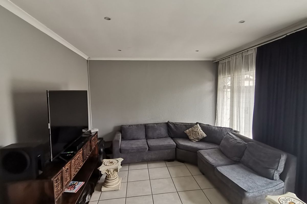 Welcome to this Exquisite Three Bedroom House with Swimming pool  and Carport nestled in the heart - Photo 5