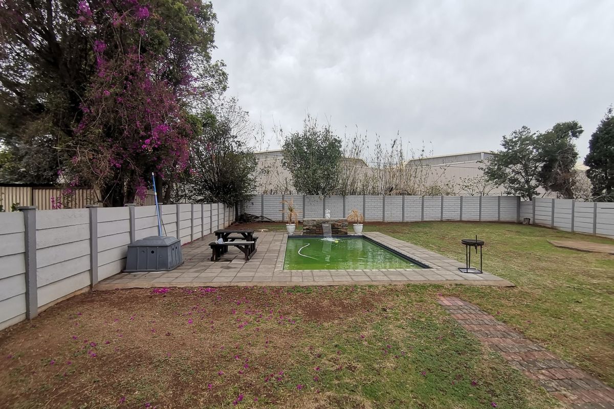 Welcome to this Exquisite Three Bedroom House with Swimming pool  and Carport nestled in the heart - Photo 2