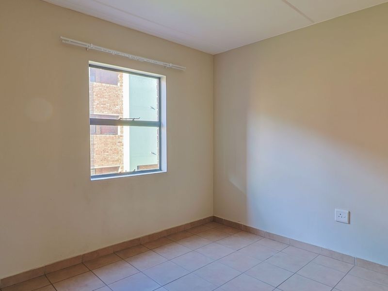 Modern Elegant Two Bedroom Apartment with Single Carport in Sought-After Route 82 Village 1 Complex - Photo 9