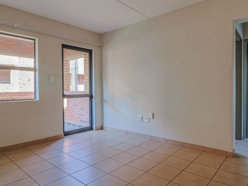 Modern Elegant Two Bedroom Apartment with Single Carport in Sought-After Route 82 Village 1 Complex - Photo 6