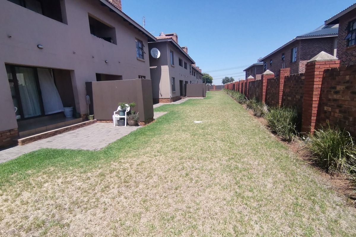 Modern Three Bedroom Ground Floor Apartment with Two Covered Carports in sought -after Storks Nest - Photo 2
