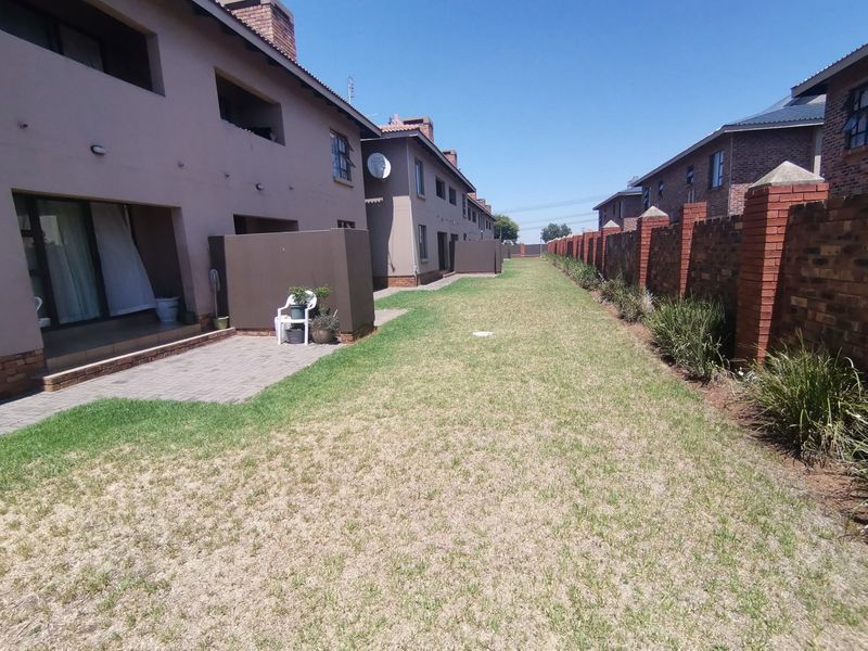 Modern Three Bedroom Ground Floor Apartment with Two Covered Carports in sought -after Storks Nest - Photo 2