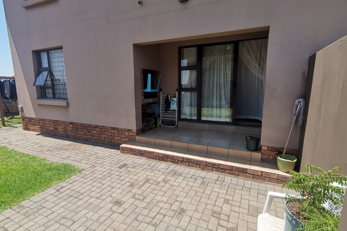 Modern Three Bedroom Ground Floor Apartment with Two Covered Carports in sought -after Storks Nest - Photo 3