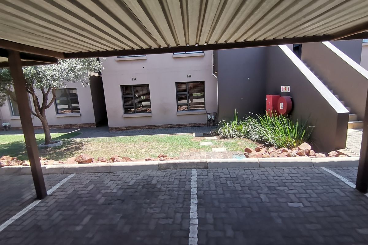 Modern Three Bedroom Ground Floor Apartment with Two Covered Carports in sought -after Storks Nest - Photo 4