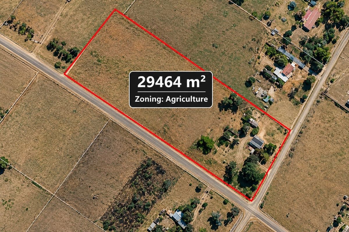 Aerial view of a 29,464 square meter agricultural small holding, highlighting the property boundaries and surrounding landscape.