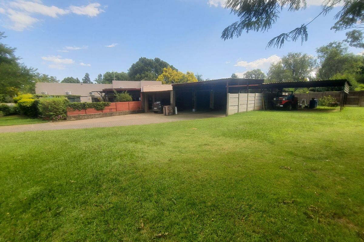 Stunning 3-Bedroom Family Home with Granny Flat & Exceptional Outdoor Living - Photo 5