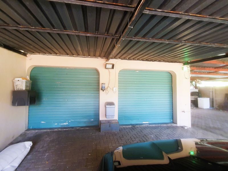 Stunning 3-Bedroom Family Home with Granny Flat & Exceptional Outdoor Living - Photo 8