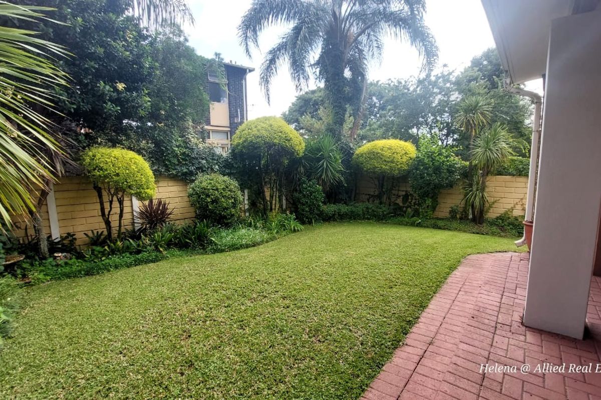 Cozy 2-Bedroom with Stunning Garden! - Photo 2