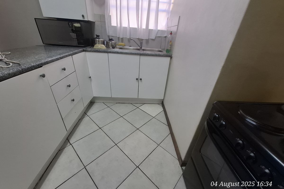 Secure & Simply Convenient – The Perfect Sunny Ridge Apartment! - Photo 3