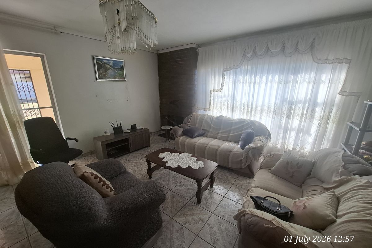 A Home Full of Potential in the Heart of Hutten Heights! - Photo 2