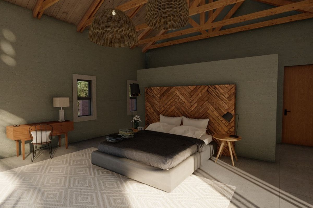 Spacious bedroom featuring a vaulted ceiling with exposed timber trusses, textured walls, and tiled flooring, creating a warm and inviting atmosphere.